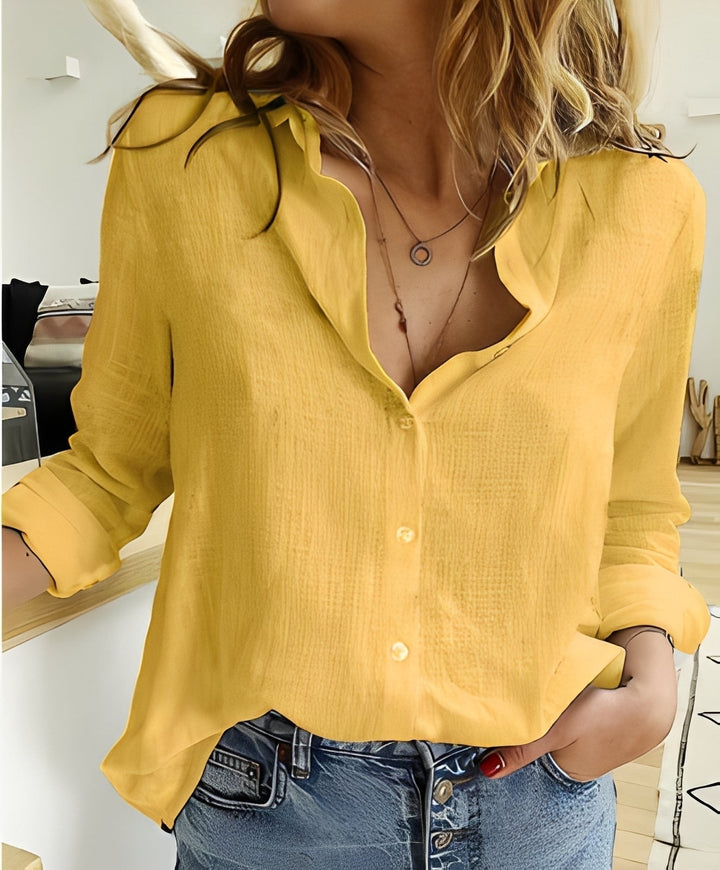 Camisa de manga comprida feminina solta, caimento casual e moderno. Blusão confortável para o dia a dia.