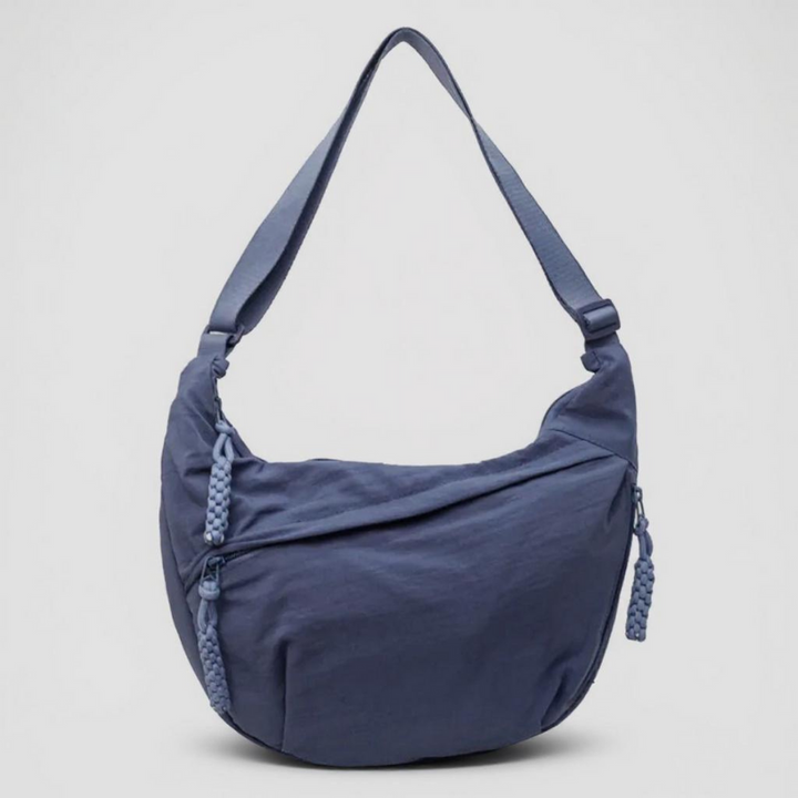 Elegante bolsa feminina transversal antifurto preta, com zíperes seguros e amplo espaço, perfeita para todos os pertences.