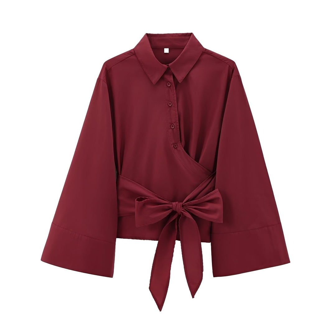 Blusa feminina elegante de estilo descontraído com cinto. Perfeita para um look casual chic.