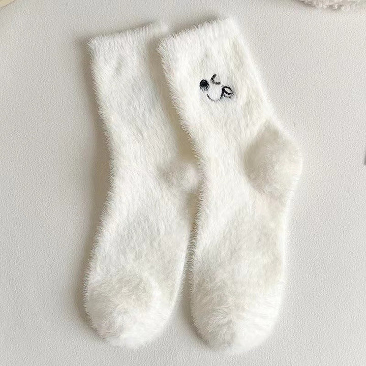 Meias femininas fofas e aconchegantes para o inverno. Proporcionam conforto e relaxamento, perfeitas para dias frios.