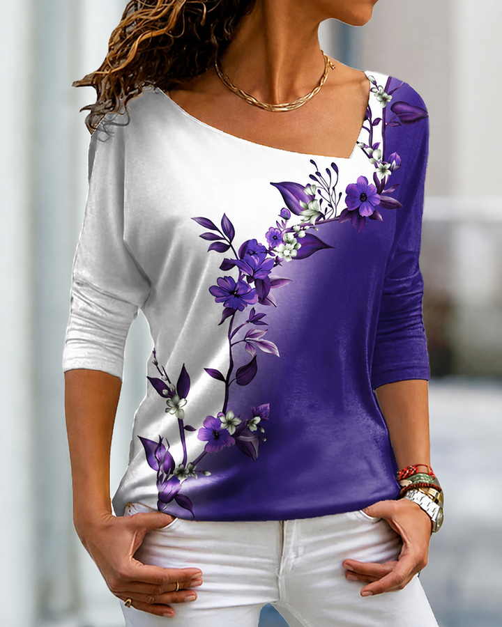 Blusa feminina versátil de manga longa com estampa floral. Ideal para looks de primavera/verão. Estilo fluido.
