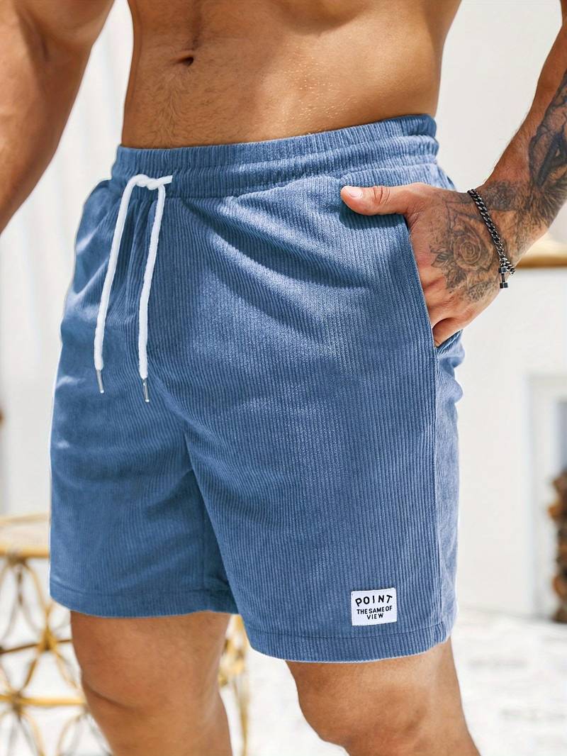 Shorts esportivos masculinos, ideais para atividades na praia, com secagem rápida e design moderno.
