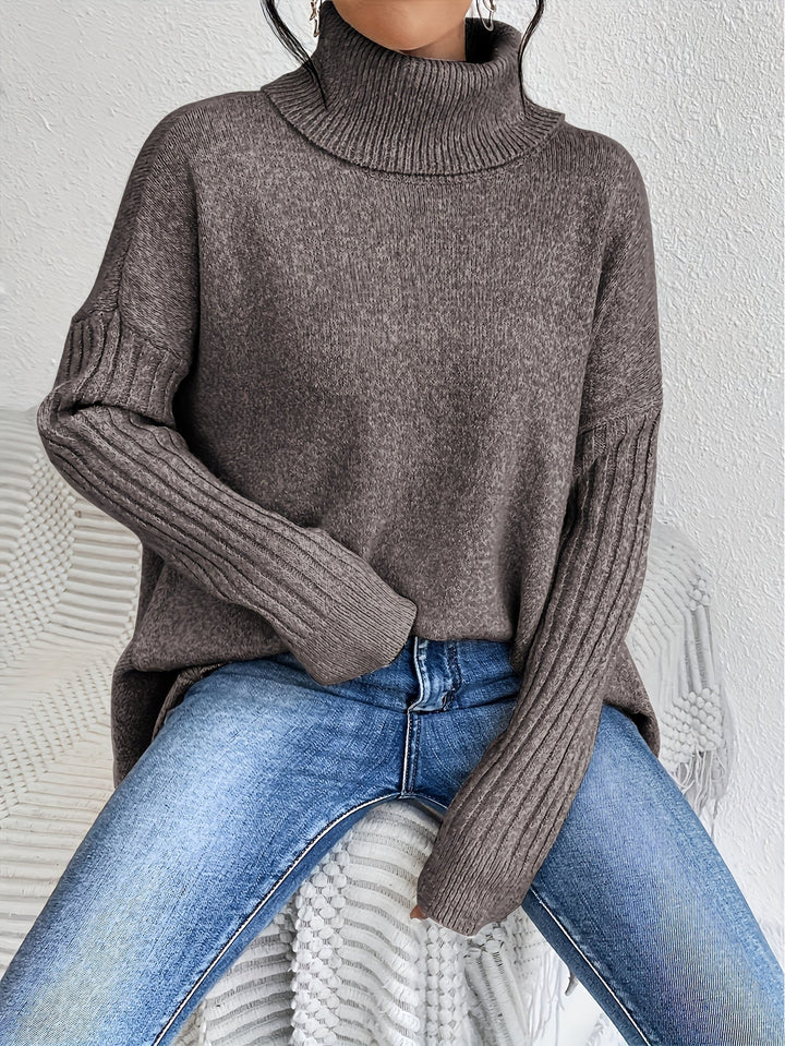 Camisa polo feminina oversized em tom pastel. Estilo suave, confortável e na moda.