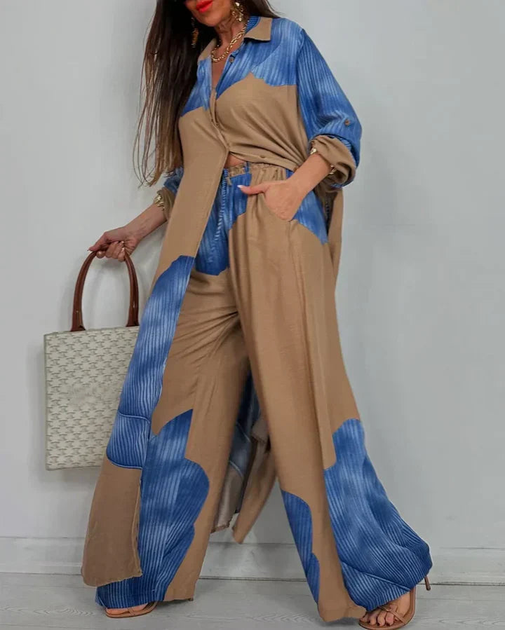 Conjunto elegante feminino com blusa e calça pantalona estampada, ideal para um visual moderno e versátil.