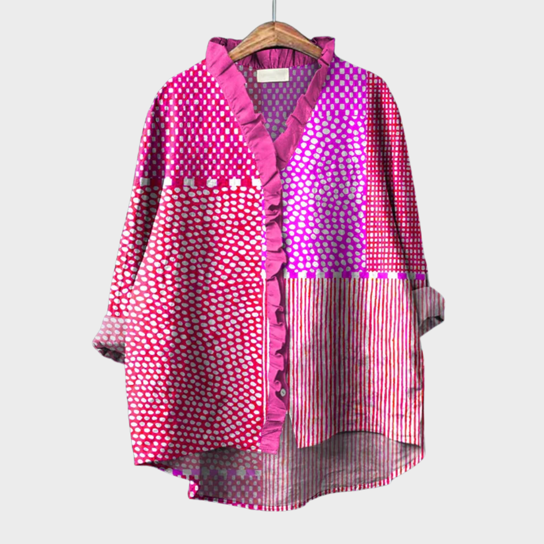 Blusa feminina elegante de verão com padrão artístico abstrato em tons de rosa e violeta, manga longa, estilo chique.