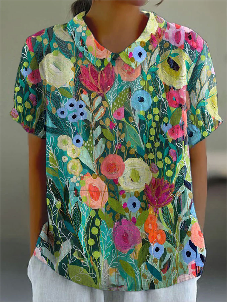 Camisa feminina floral aquarela vibrante para primavera/verão. Estampa multicolorida casual elegante, perfeita para moda feminina.