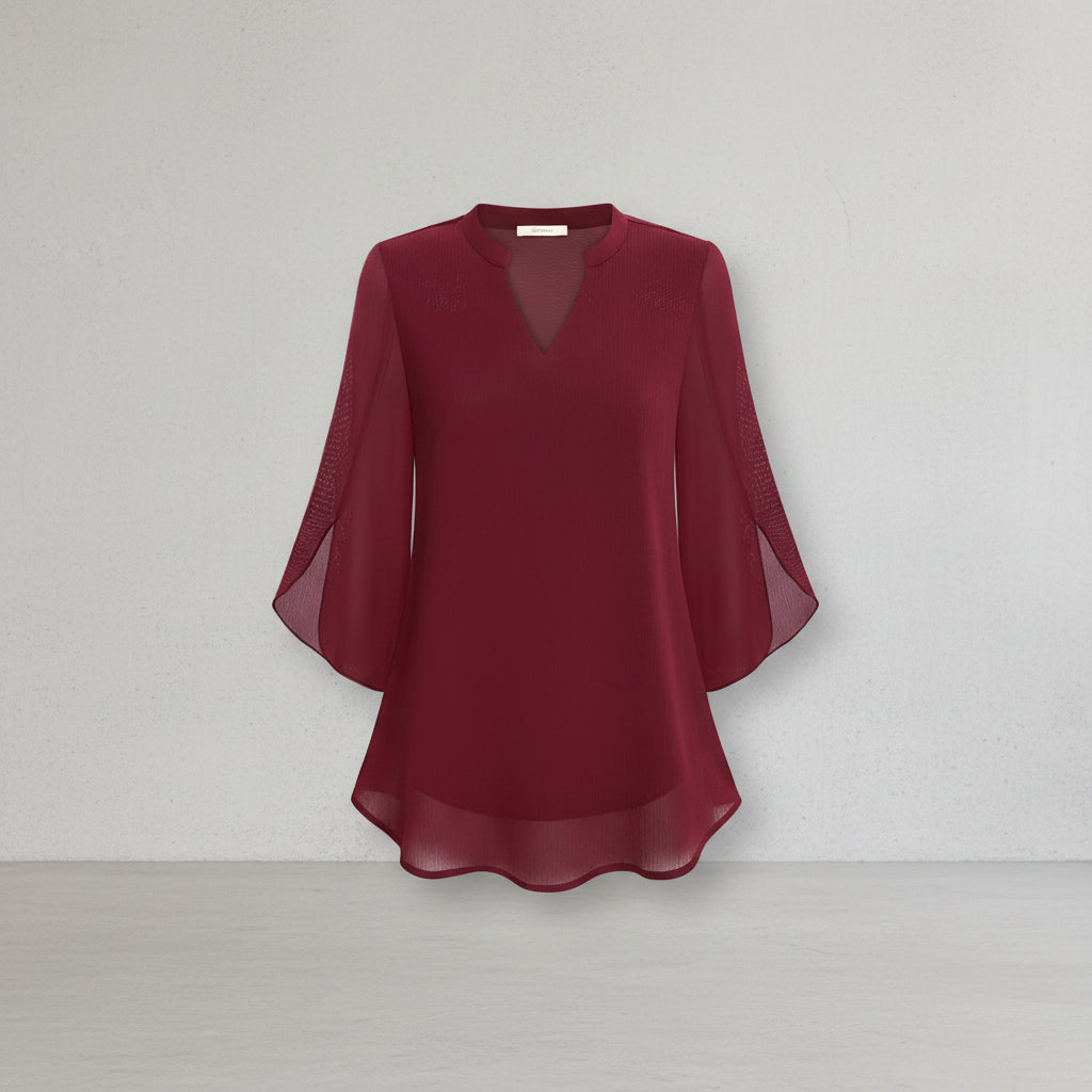 Blusa feminina Brianna com mangas abertas para um visual elegante de verão ou casual chique.