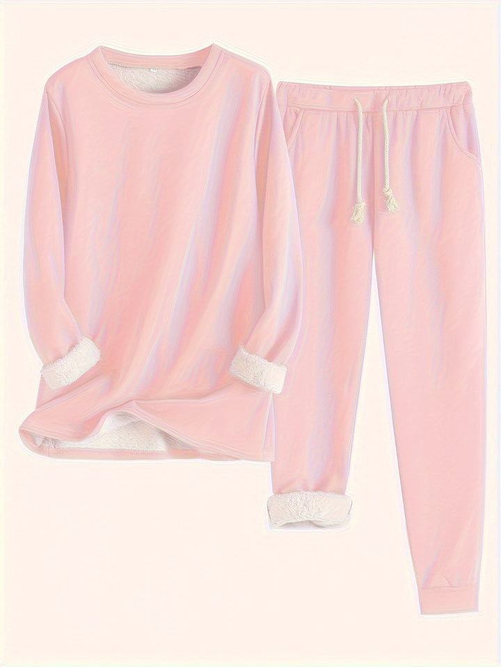 Conjunto de moletom e calça jogger feminino em cor neutra, versátil para looks casuais e relaxantes.