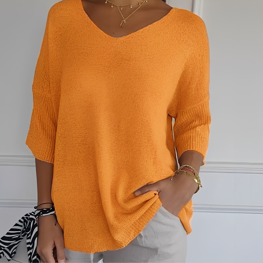 Moda feminina inverno: Suéter longo e confortável, perfeito para dias frios. Blusa elegante.