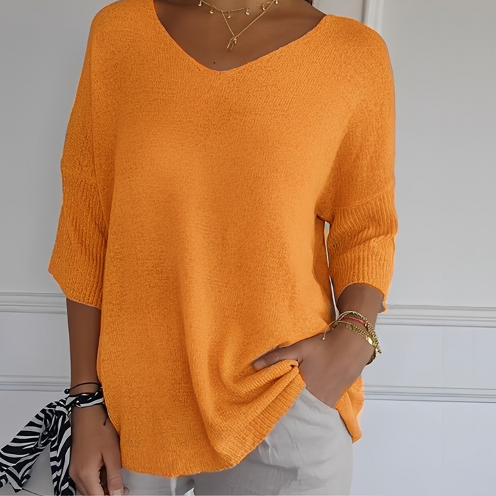 Moda feminina inverno: Suéter longo e confortável, perfeito para dias frios. Blusa elegante.