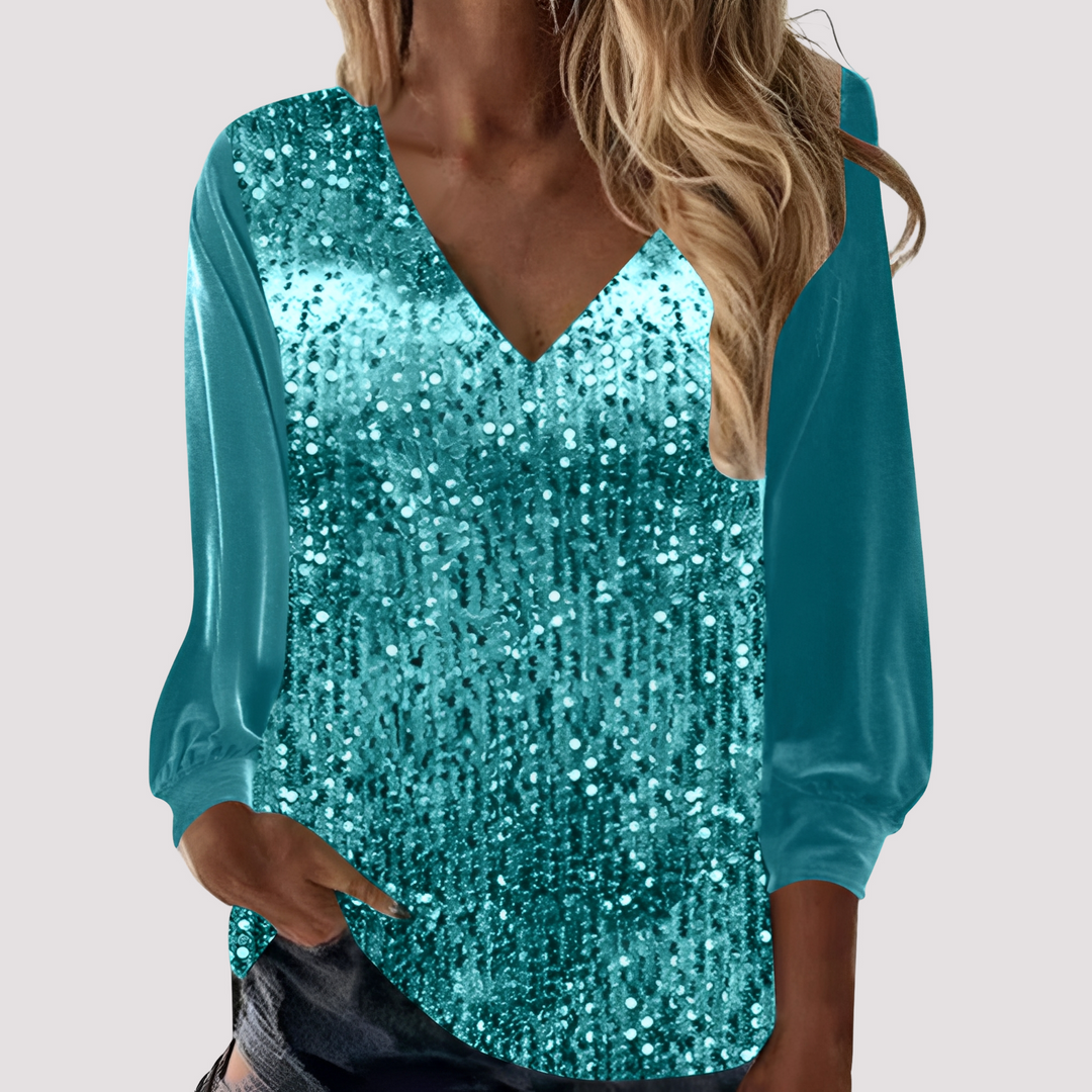 Top feminino casual chic de manga longa com lantejoulas, ideal para o verão e eventos noturnos.