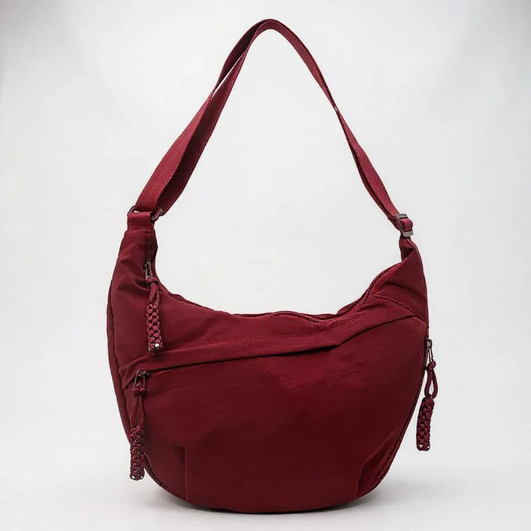 Bolsa de ombro Aria feminina em nylon, design moderno e multifuncional para qualquer ocasião.