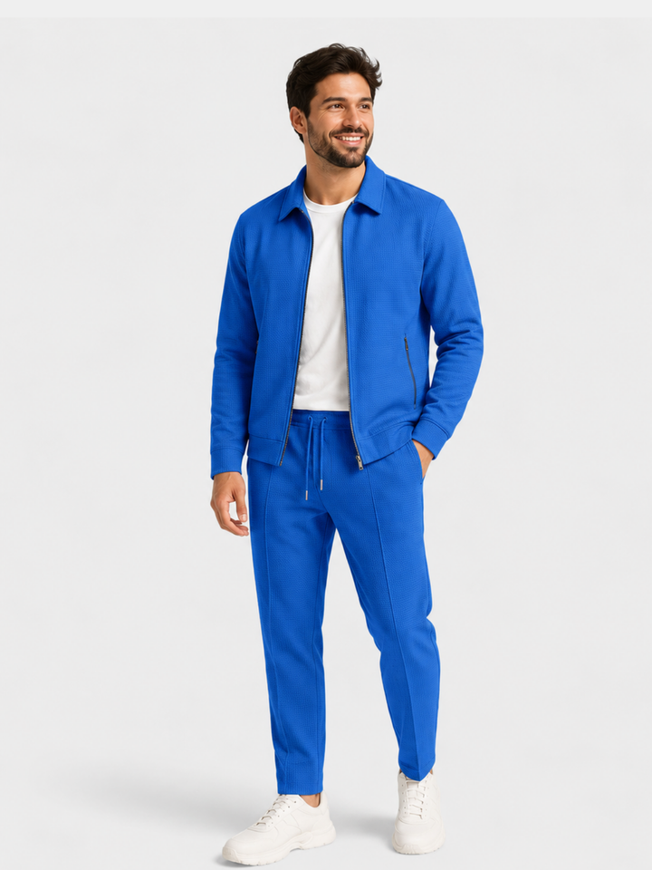 Conjunto masculino moderno, incluindo calça e blusa slim em tecido elegante para homem.