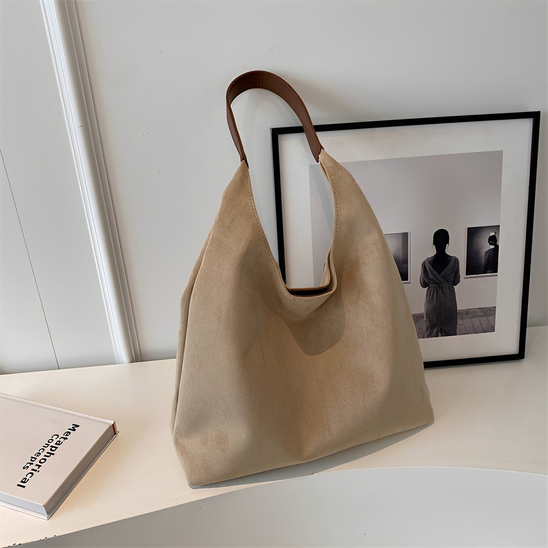 Bolsa tote feminina grande e estilosa para o dia a dia e trabalho, acessório versátil.