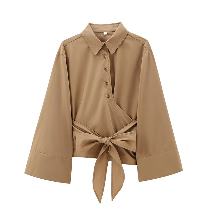 Blusa feminina de verão com cinto, combinando elegância e conforto. Ideal para diversas ocasiões.