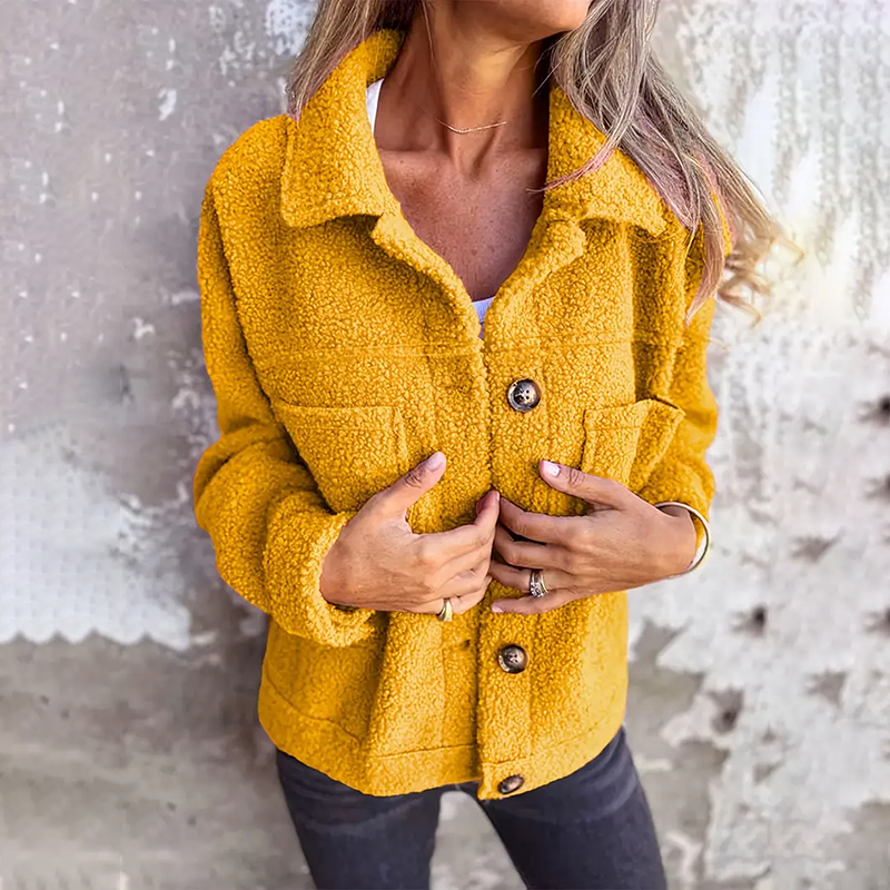 Casaco feminino moderno com gola de reverso elegante, perfeito para outono e primavera. Estilo casual e sofisticado.