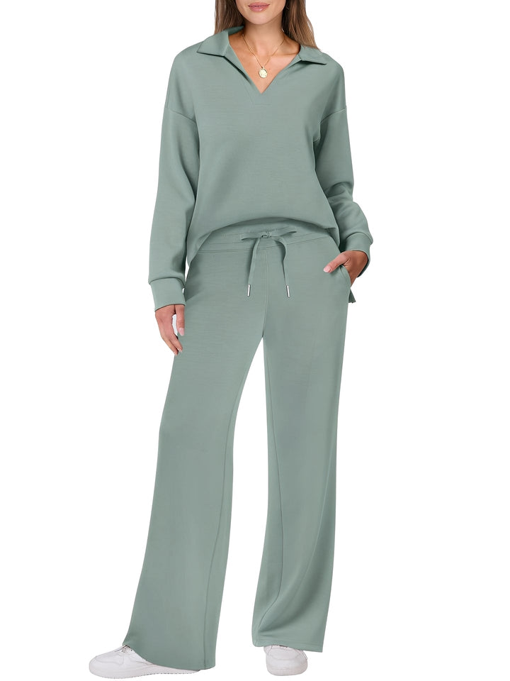Look feminino de suéter macio e calças casuais, perfeito para o home office ou lazer com estilo e conforto.