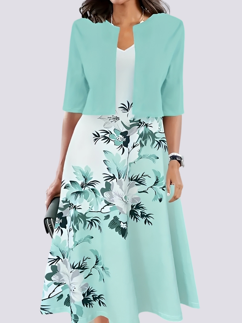 Conjunto bifásico feminino elegante com vestido longo fluido, perfeito para eventos de verão.