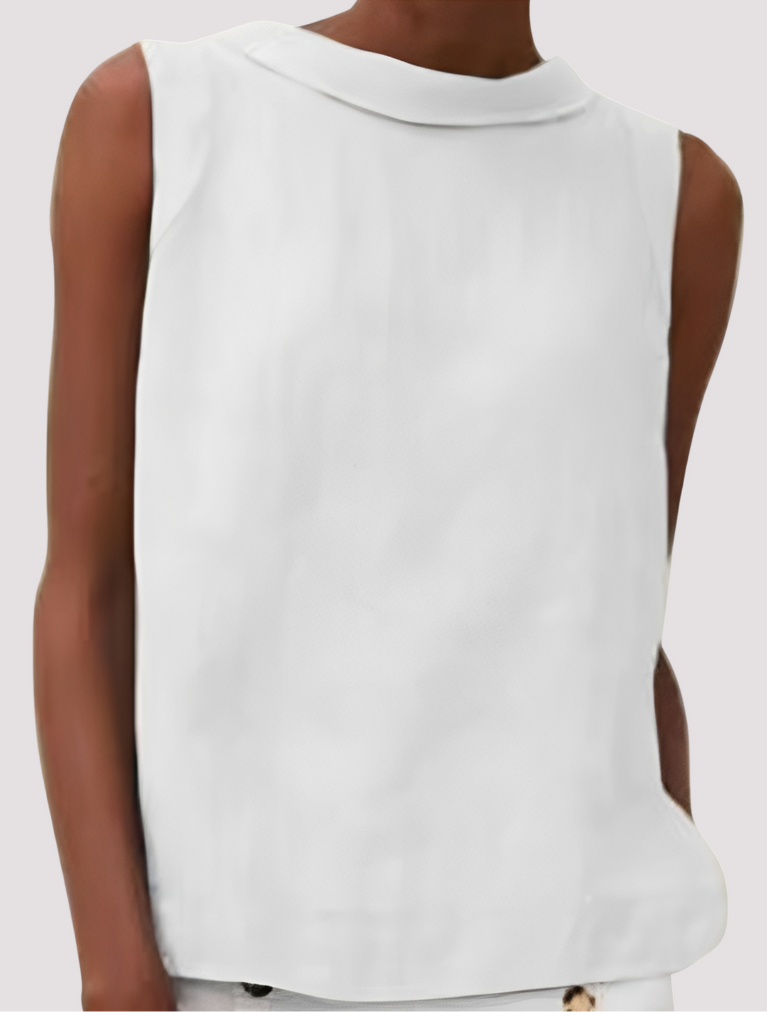 Top casual feminino sem mangas leve, perfeito para o verão e estilo descontraído. Conforto e moda feminina.