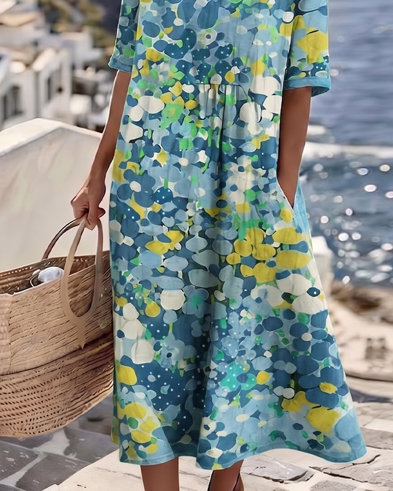 Vestido feminino midi floral solto, leve. Conforto e elegância para primavera e verão.