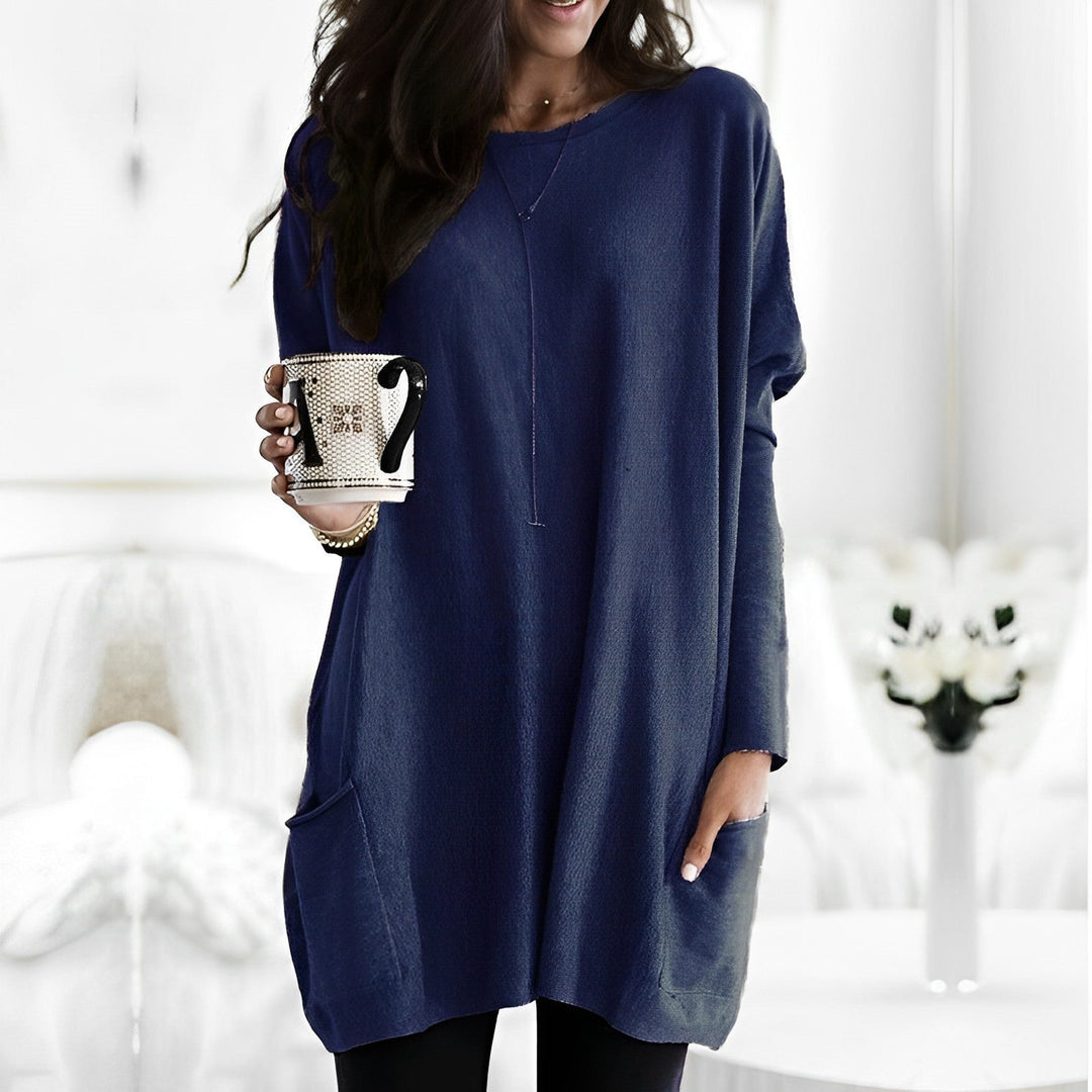 Blusa feminina de manga longa, design moderno e elegante para qualquer ocasião.