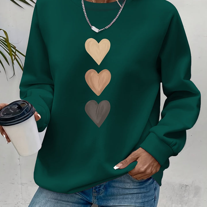 Versátil camisola feminina Amara, design de corações, perfeita para combinar com looks casuais e chiques.