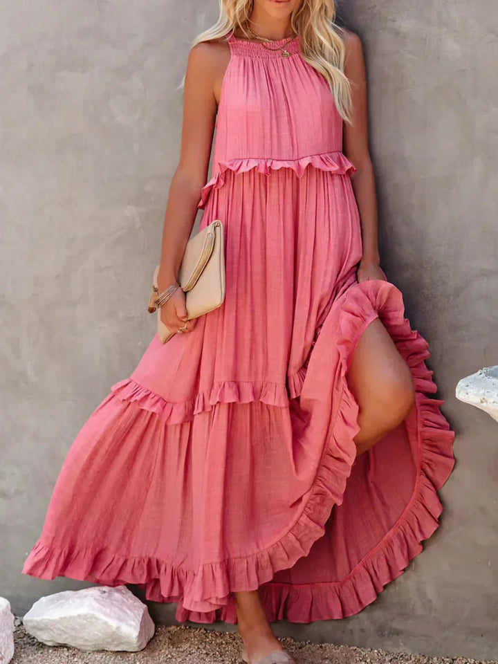 Vestido longo feminino com babados e alças finas, estilo boêmio chic. Conforto e moda.