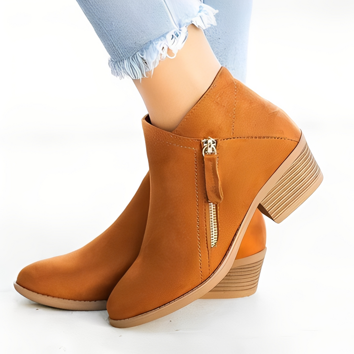 Par de botas femininas de inverno, confortáveis e versáteis. Calçado feminino ideal para estilo casual e elegante.