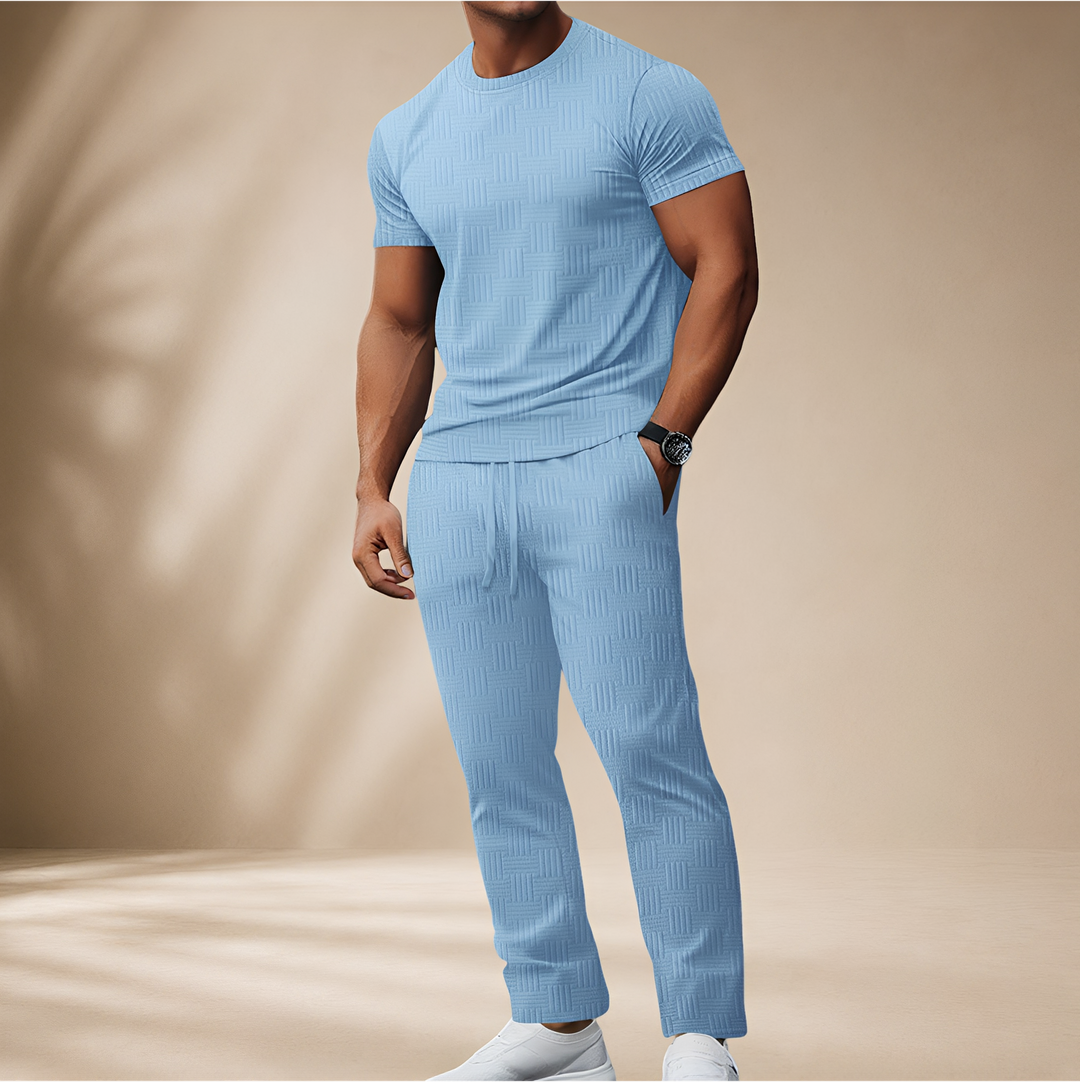 Conjunto masculino elegante de camiseta e calças confortáveis para verão. Estilo casual e moderno em tecido respirável.
