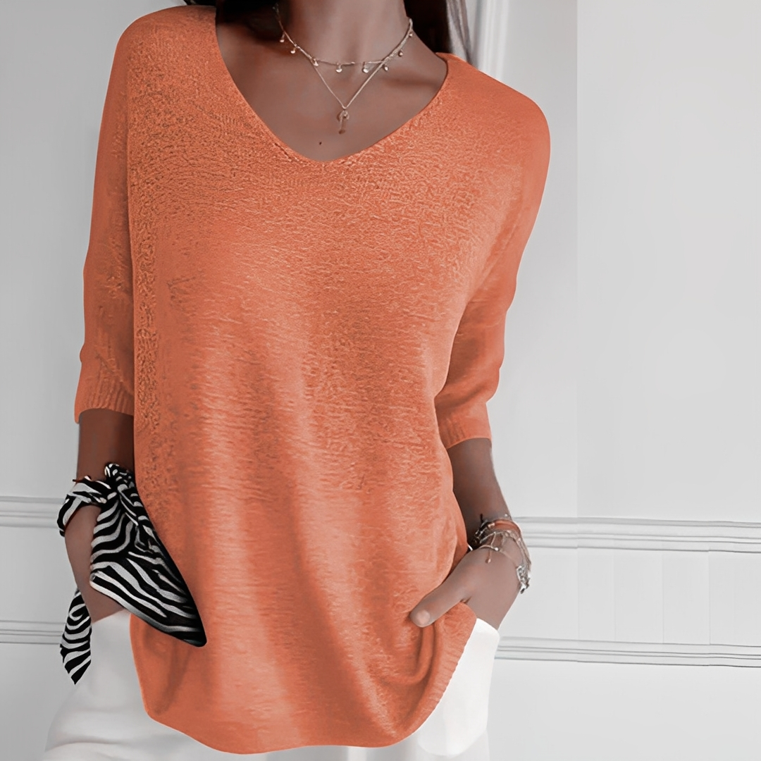 Blusa de suéter feminina longa, elegante e super confortável. Perfeita para looks de inverno.