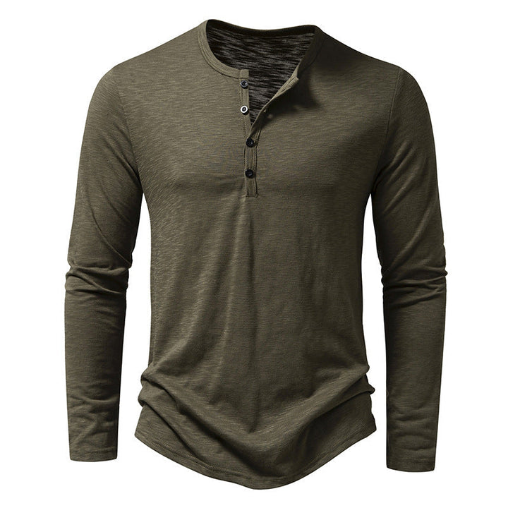 Camisa masculina de manga longa casual, com botões, oferece conforto e estilo para o dia a dia. Peça versátil.