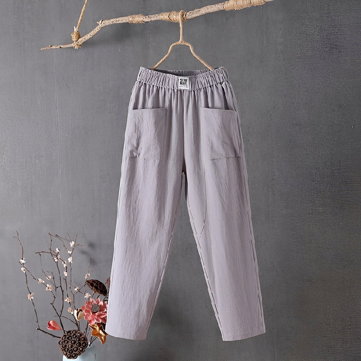 Calça Maisy casual feminina em tecido leve. Conforto e estilo para dias de verão e lazer.