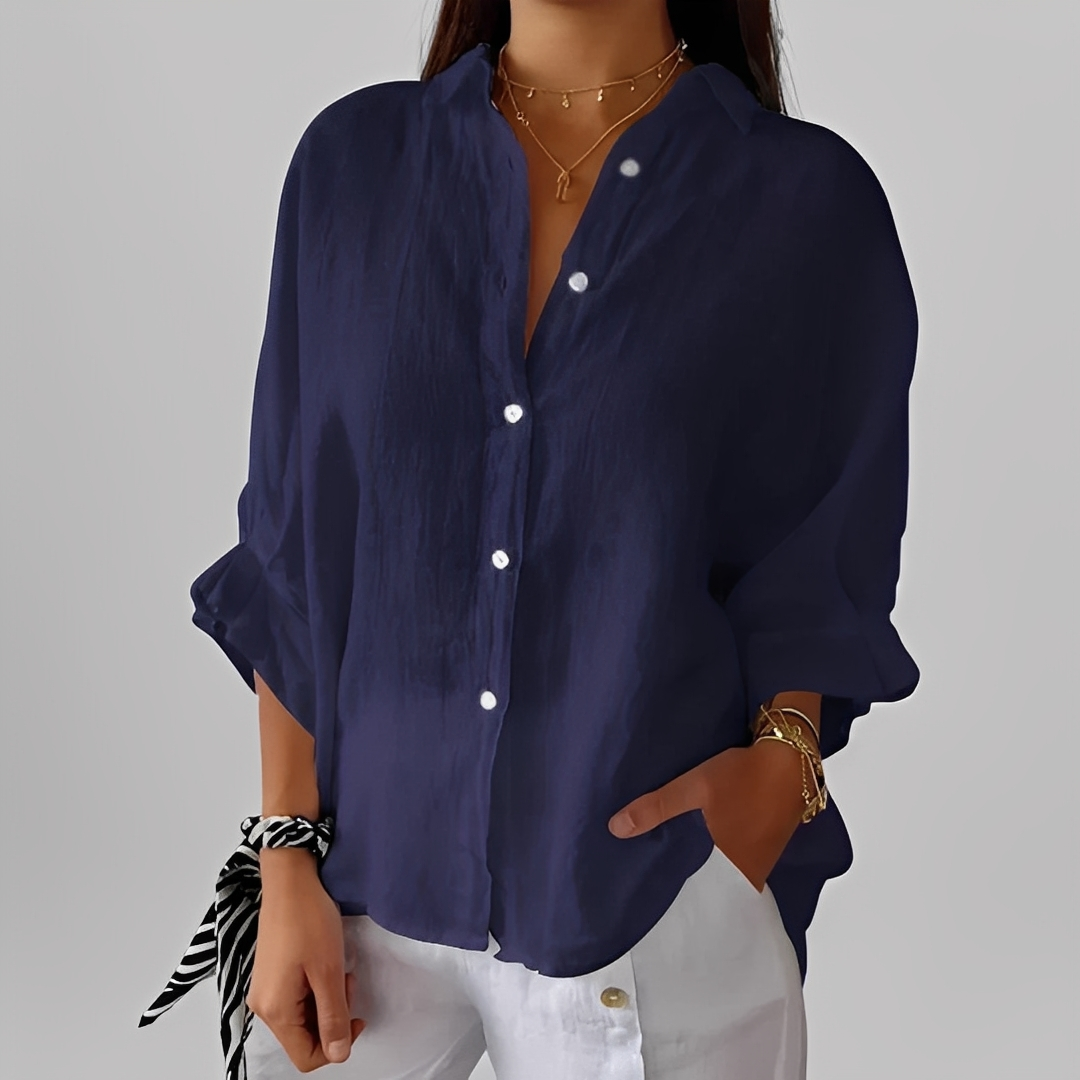 Blusa feminina elegante manga longa. Roupa de trabalho sofisticada ou look casual chic. Conforto e versatilidade.
