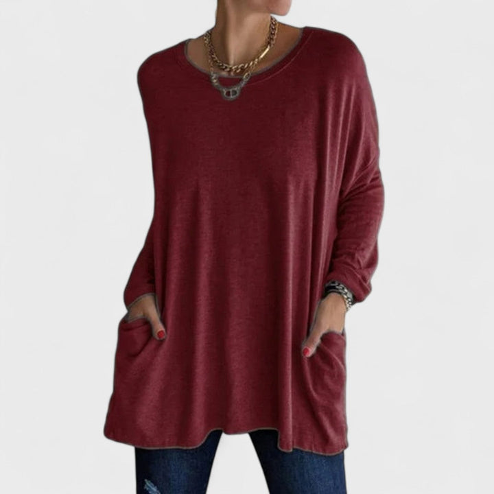 Blusa feminina versátil Moira de manga longa, look relaxado e confortável para qualquer ocasião.