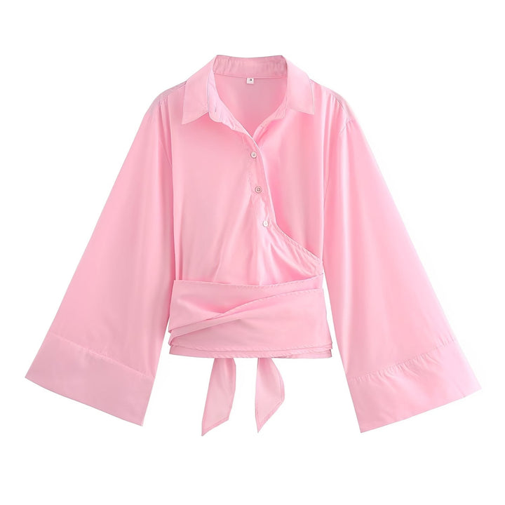 Tops femininos para o verão: Blusa com cinto, estilo moderno e cores vibrantes. Moda versátil.