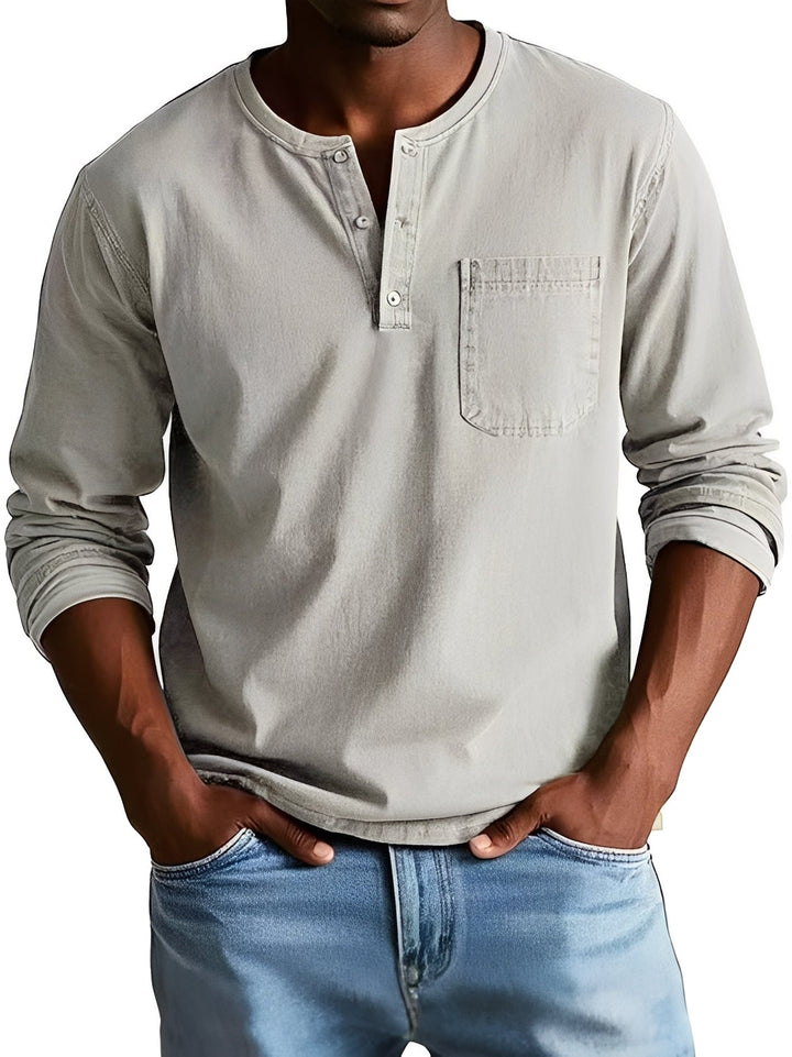 Camisa masculina casual de manga longa em tecido confortável, um item essencial para o guarda-roupa moderno.
