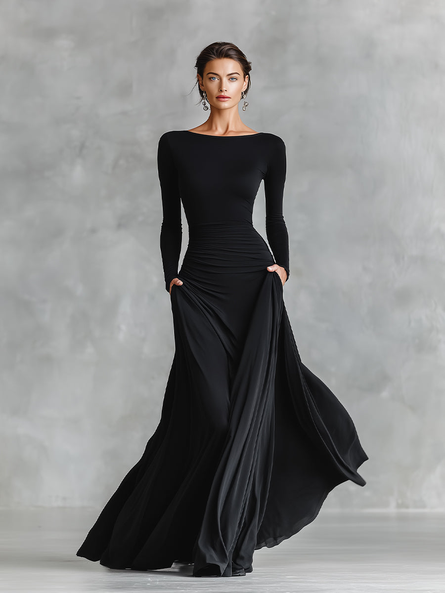 Vestido longo feminino preto com design elegante de pregas fluidas, moda para festas e jantares de gala.