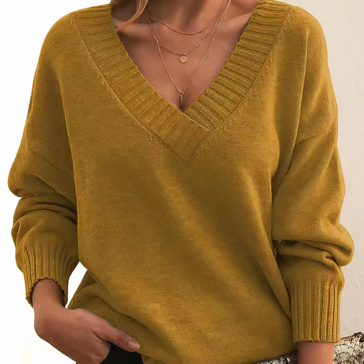 Suéter feminino decote V, para escritório ou casual, unindo elegância e conforto.