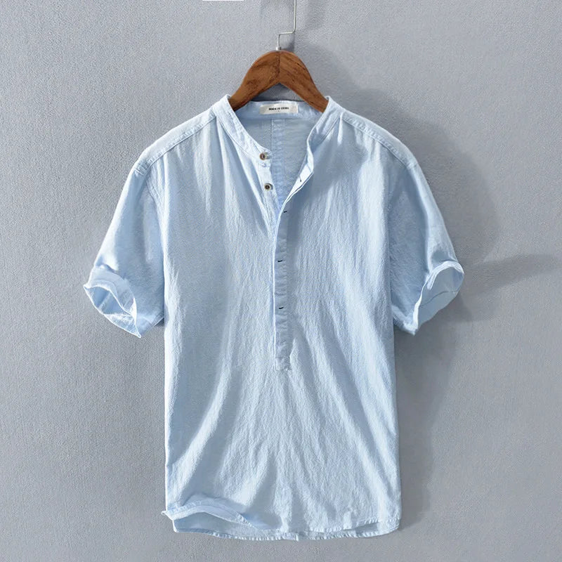 Camisa feminina de manga curta com botões, perfeita para o verão e primavera. Conforto e estilo casual para o dia a dia.