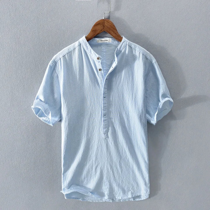 Camisa feminina de manga curta com botões, perfeita para o verão e primavera. Conforto e estilo casual para o dia a dia.