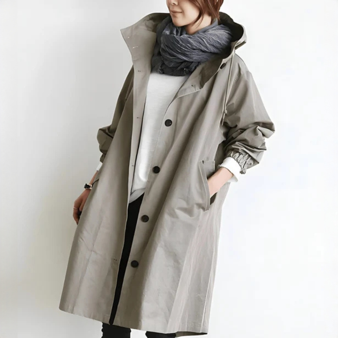 Casaco de chuva feminino com estilo casual, oferece proteção e elegância para transição de estações.