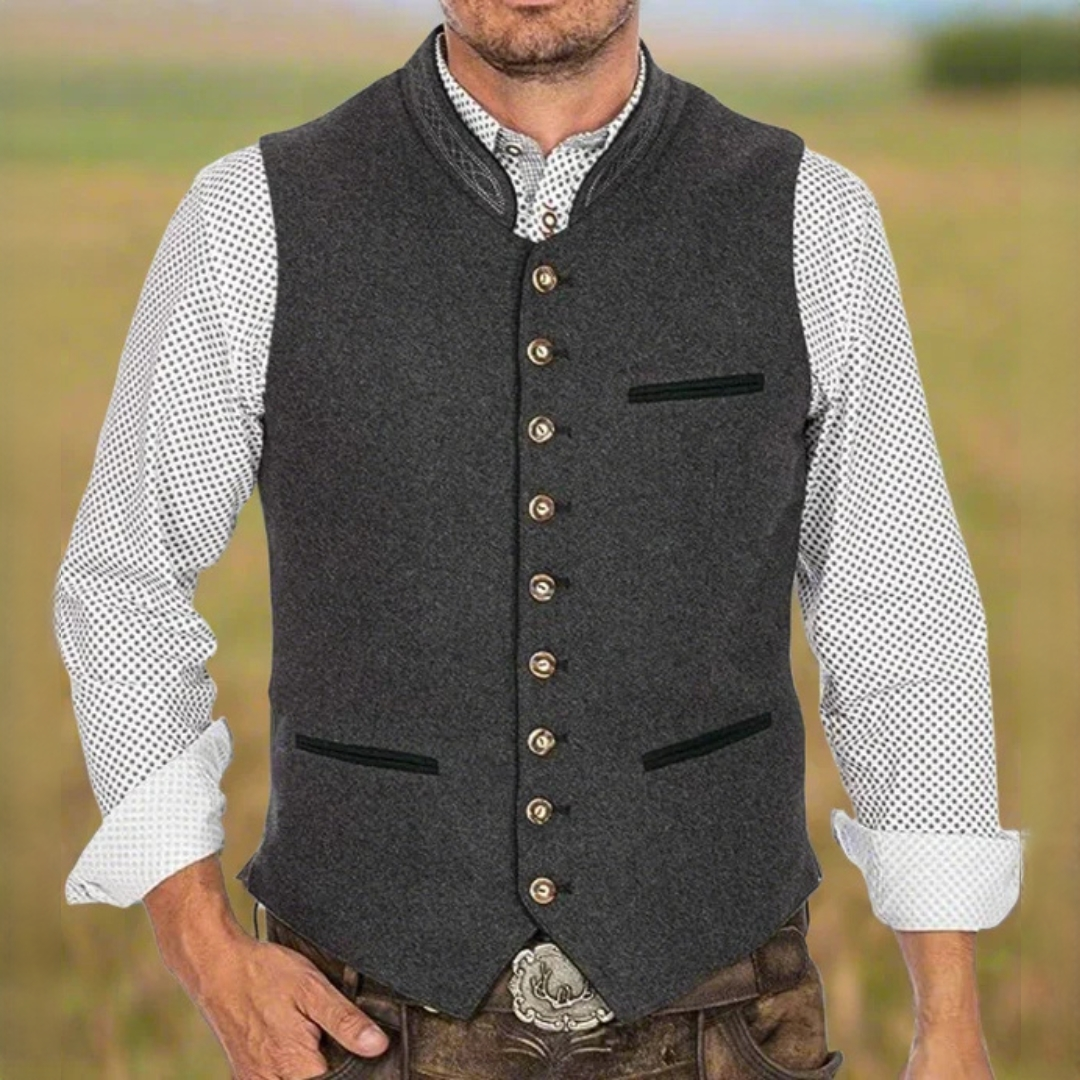 Colete masculino tradicional cinza escuro, elegante e confortável, ideal para looks casuais ou sociais de inverno.