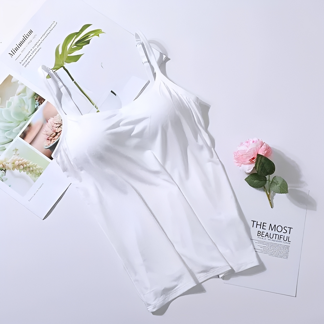 Top feminino confortável branco com sutiã integrado. Ideal para uso diário no verão, design liso.