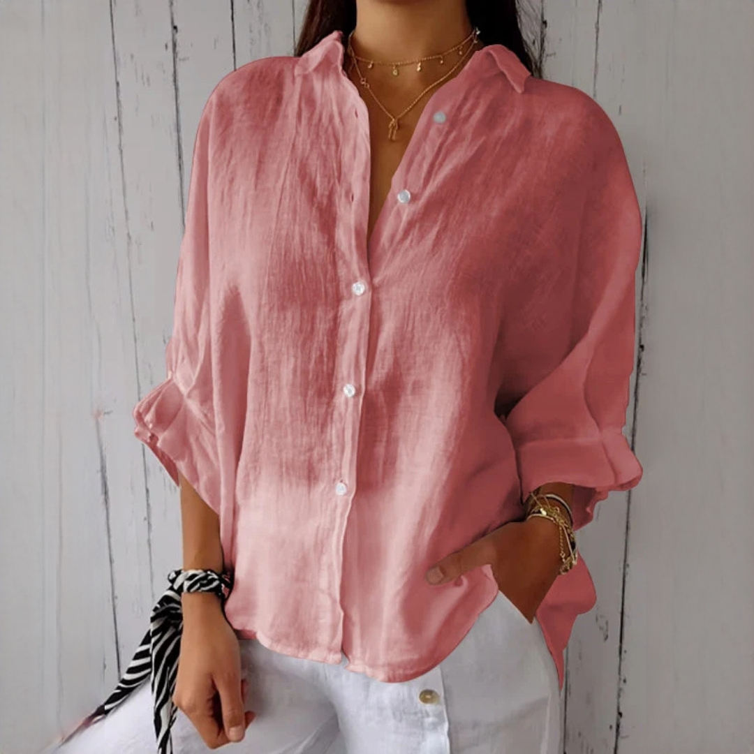 Camisa feminina Reena, blusa casual e moderna. Estilo descontraído e confortável para diversas ocasiões na moda feminina.