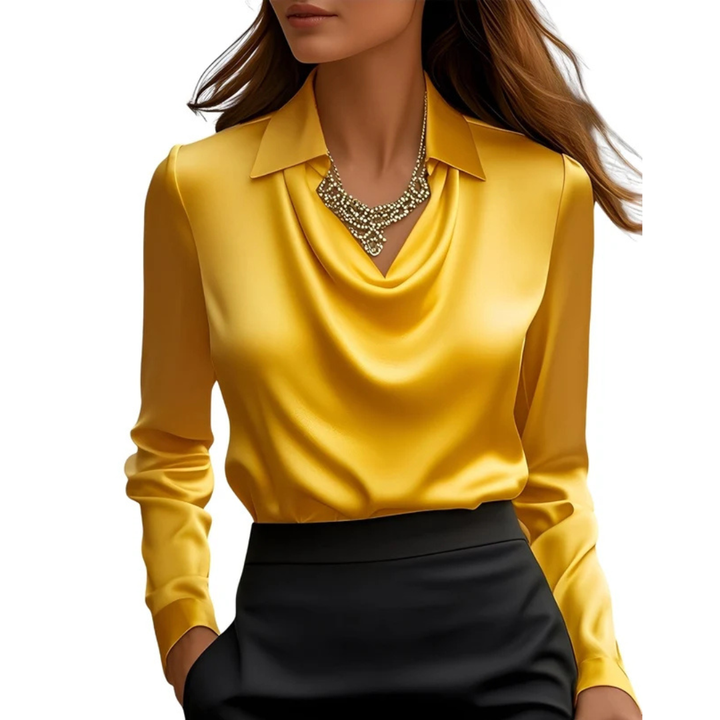 Detalhe da blusa feminina Dionne de manga longa. Estilo casual chic com toque elegante, ideal para o inverno.