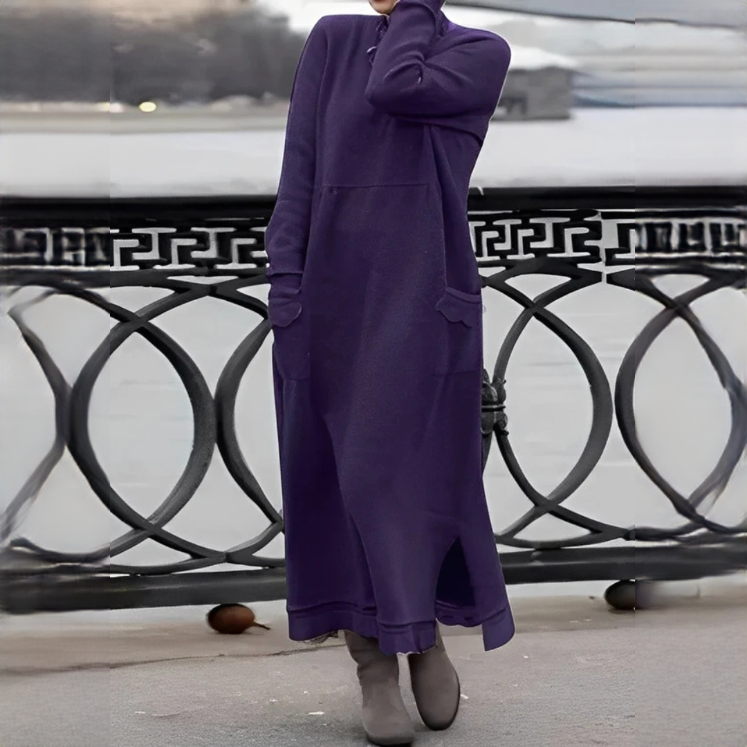 Vestido feminino midi preto elegante para o inverno. Roupa versátil e moderna, com toque confortável e quentinho.