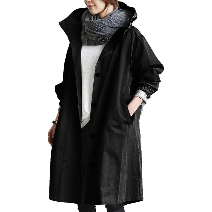 Roupa de exterior feminina impermeável. Casaco corta-vento para chuva e outono, com capuz. Estilo e proteção.