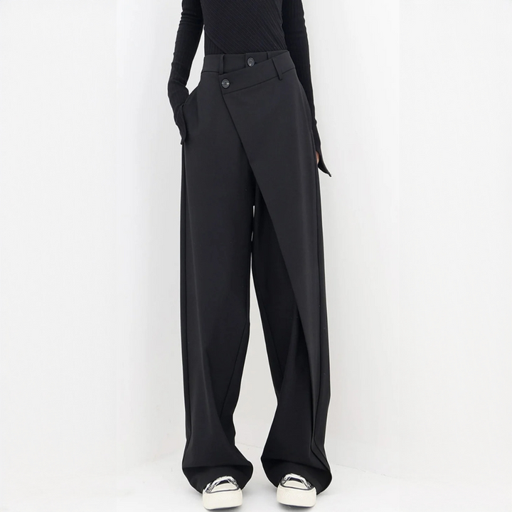 Calça feminina casual chic com corte enviesado, perna larga e design moderno. Roupa confortável para mulher.