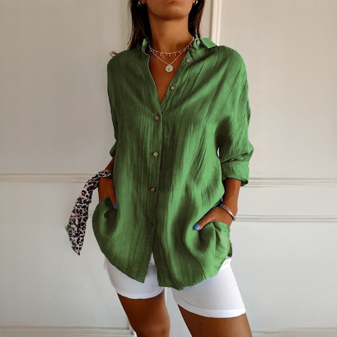 Camisa elegante de botões, moda feminina clássica com manga longa. Perfeita para um visual sofisticado.