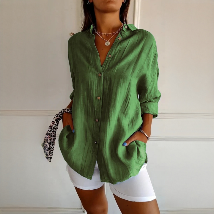 Camisa elegante de botões, moda feminina clássica com manga longa. Perfeita para um visual sofisticado.